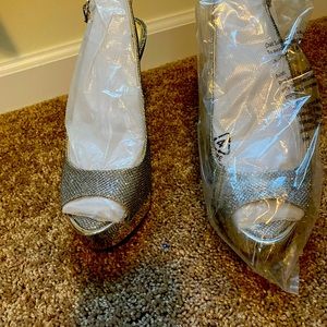 Jessica Simpson silver sparkly heel. Never worn